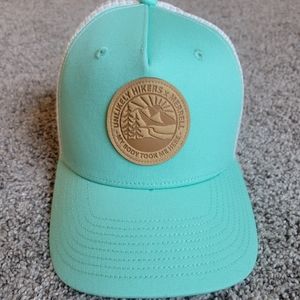 NEW- Unlikely Hikers X Merrell trucker hat
